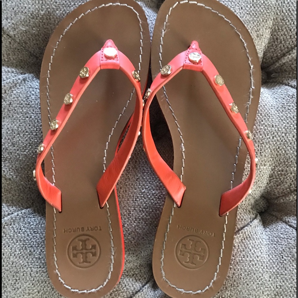 Tory Burch orange studded flip flops